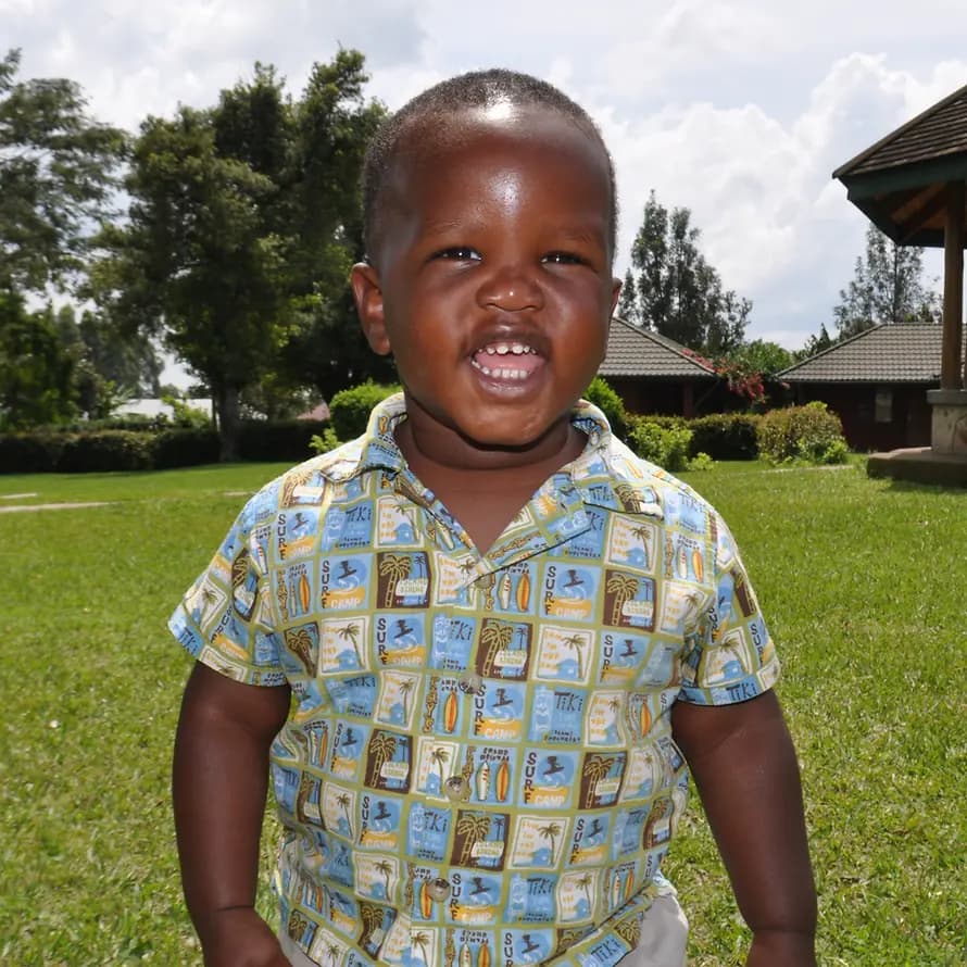 SOS-Kind in Uganda SOS-Kinderdorf Uganda hilft benachteiligten Kindern, Jugendlichen und ihren Familien